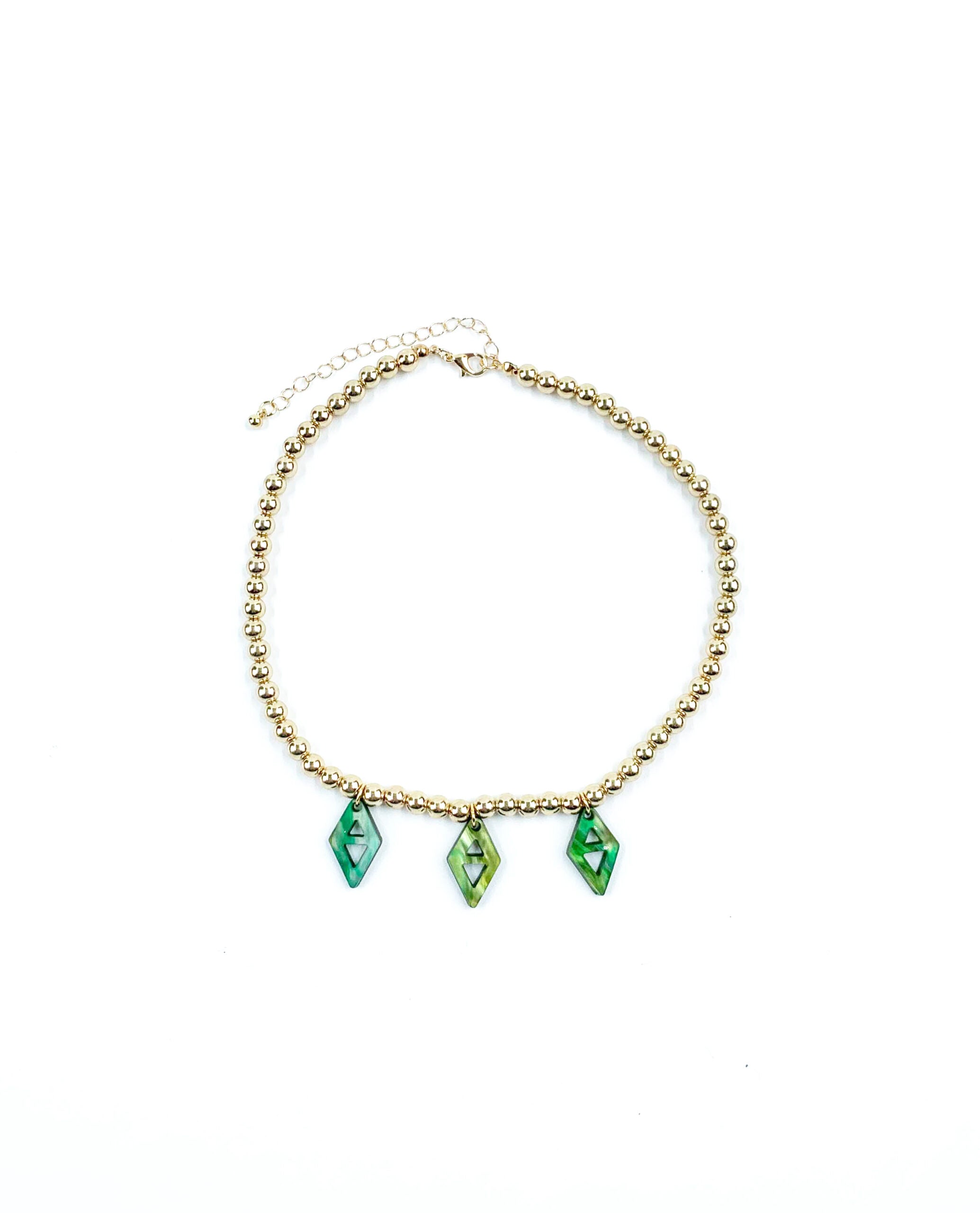Collar elegante de cuentas doradas para mujer