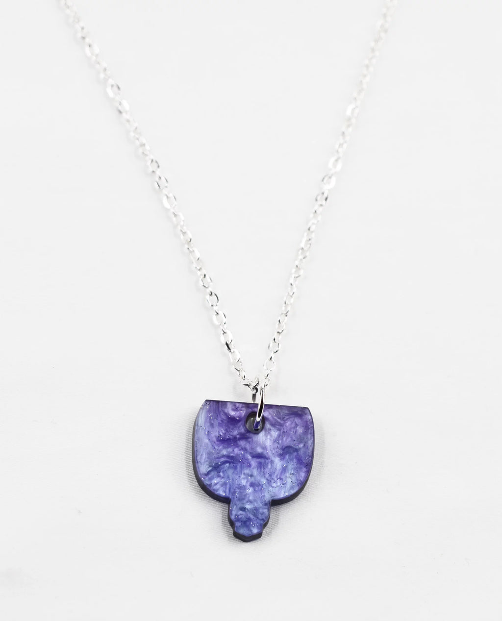 Silver necklace with marbled purple pendant