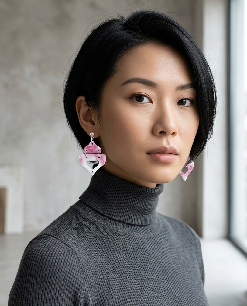 Pink marbled resin double heart earrings