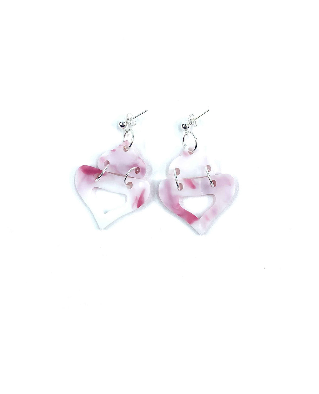 Pink marbled resin double heart earrings